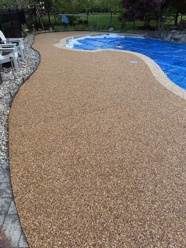 Pool deck with river rock aggregate coating — Central NJ