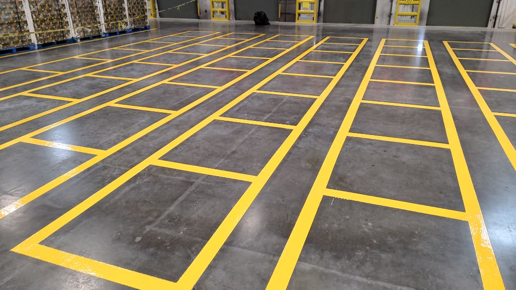 Industrial warehouse yellow box grid line striping — Baltimore, MD